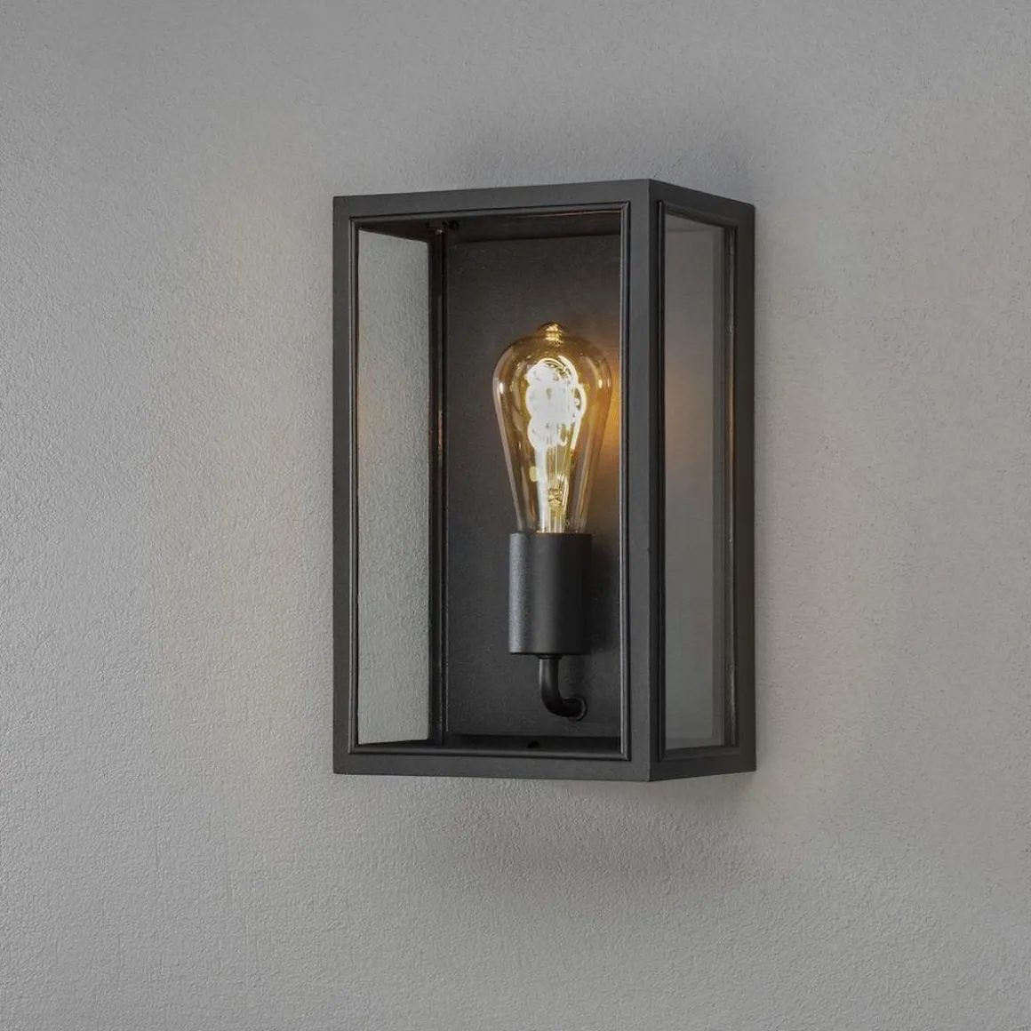 Carpi vegglampe utendørs IP44 - Svart/Klart glass